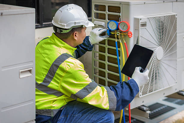 Professional Hvac technician working in Ely, MN